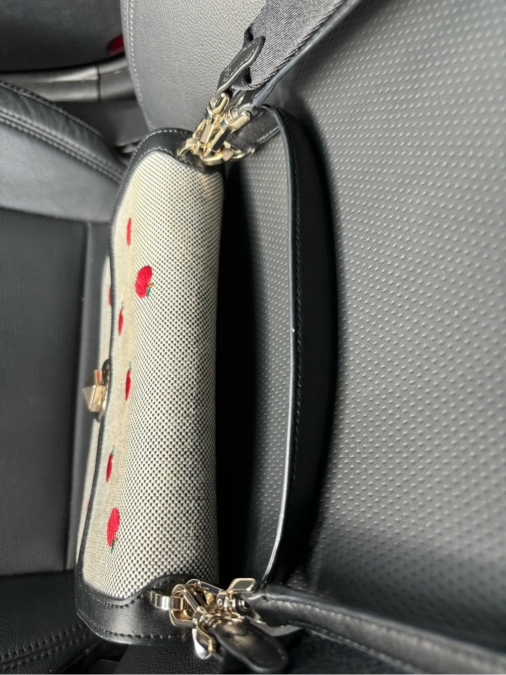 kate spade Black Trim Woven Clutch with Red Apple Embroidery